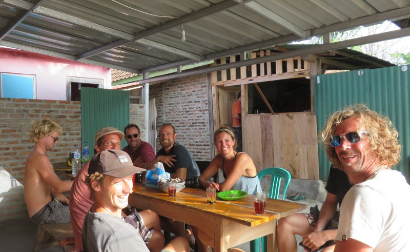 Surfers having breakfast at Kuripan warung