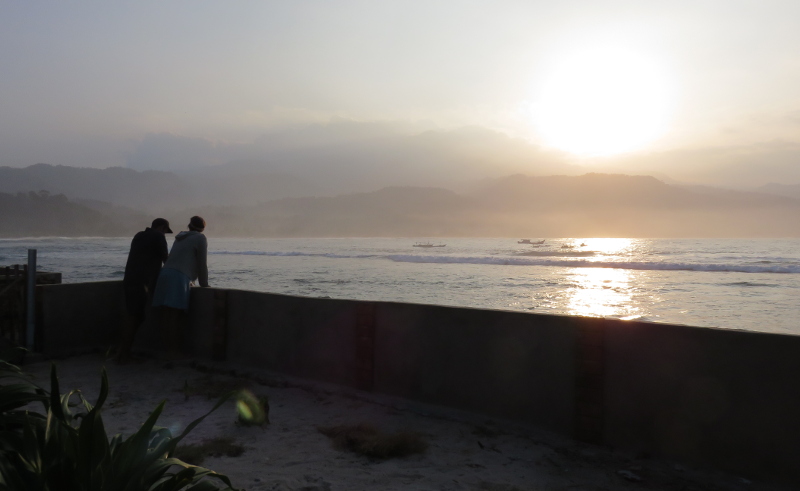 Sunrise over bay at Kuripan