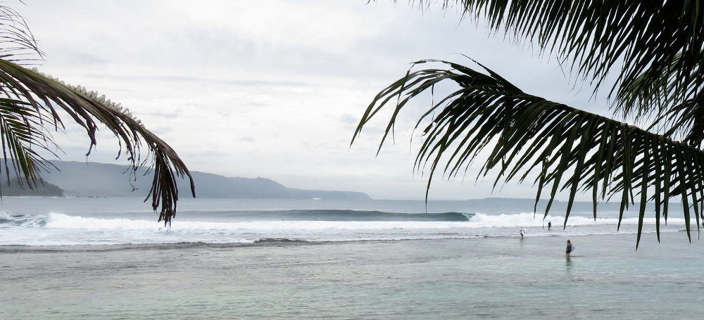 Exploring the surf at Negeri Ratu