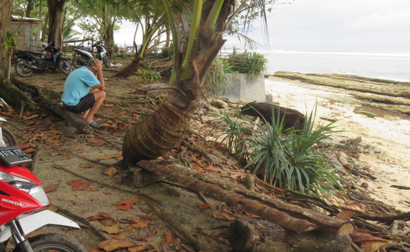 Bummed out surfer at Ujung Bocur Aug 2022