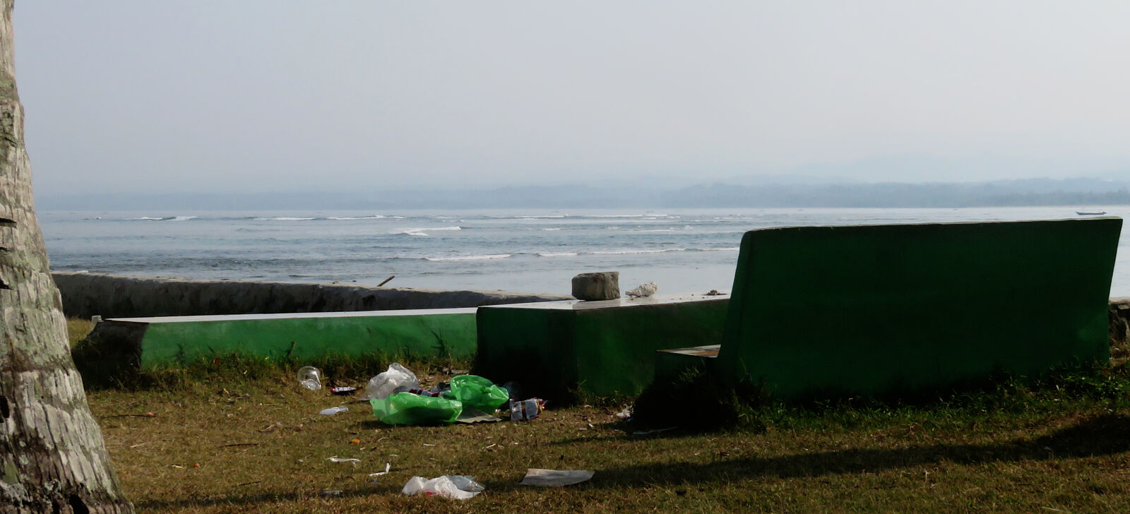 Garbage near beautiful view Tanjung Setia